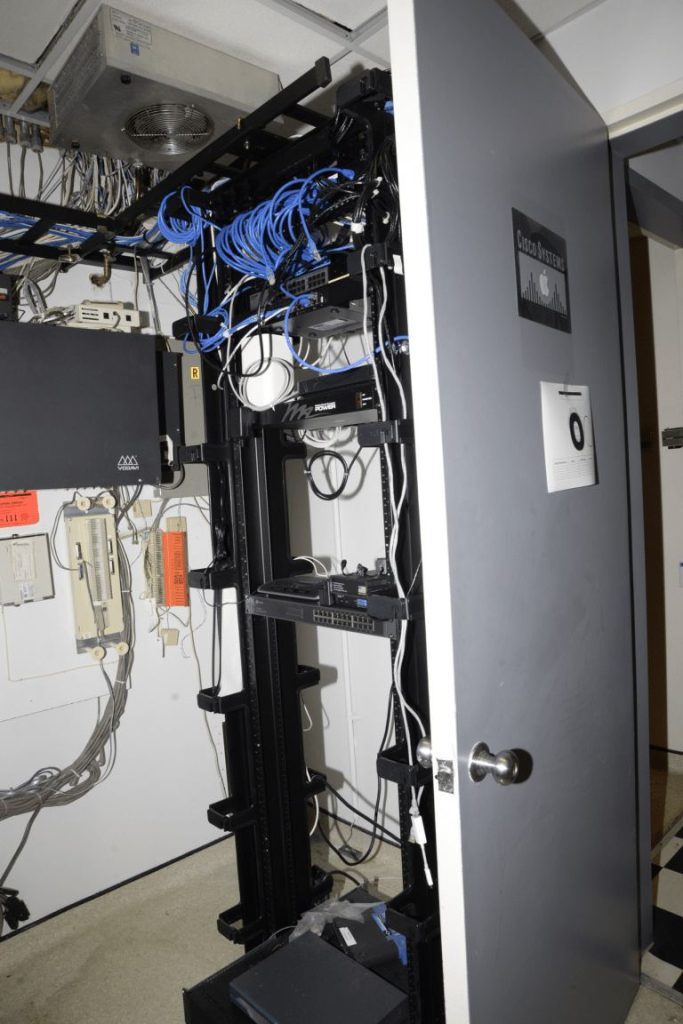 Node Operators Treat Uptime Like a Utility network cables in a blue-lit server room